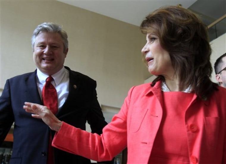 U.S. Rep. Michele Bachmann, R-Minn., arrives with her husband, Marcus, to a state GOP fundraiser on Saturday in Nashua, N.H. Bachmann recently has visited two other early nominating states and is expected to announce whether she's running for a Republican presidential nomination by early summer. 